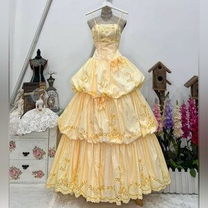 Elegant Yellow Tiered Gown